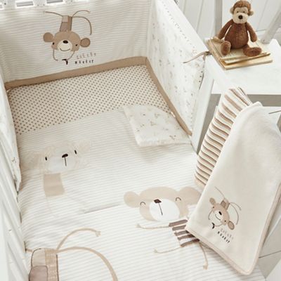 White monkey print bed in a bag